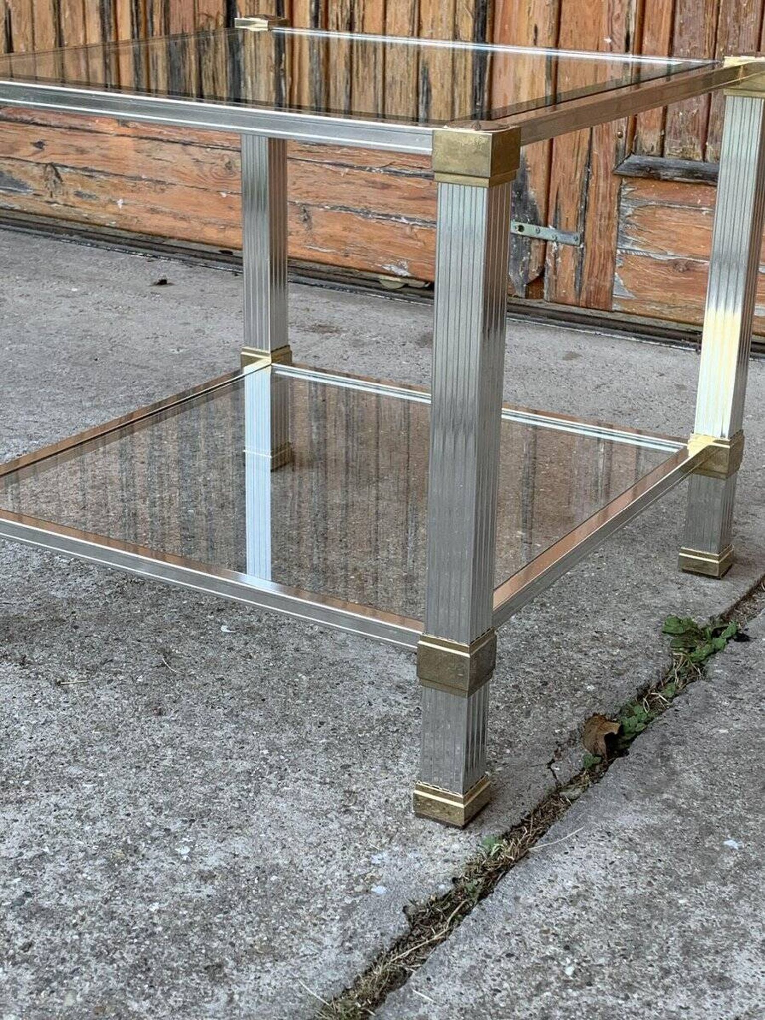 Vintage coffee table in brass and glass, with gold chrome accents — Pierre Vandel, Paris 1970s