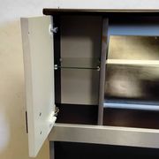 Bar cabinet / entrance furniture with a vintage 1970s mirror.
