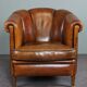Club armchair in warm coloured sheepskin