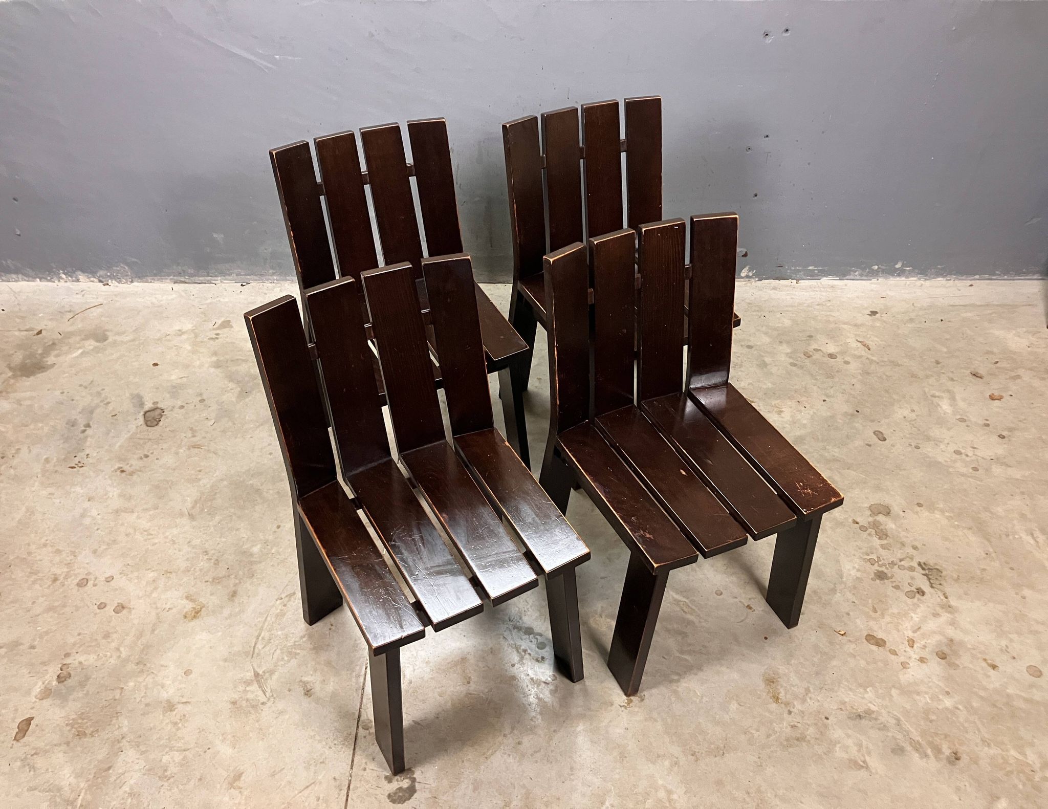 Brutalist and modernist dining chairs from the 1970s in architectural brown wood.
