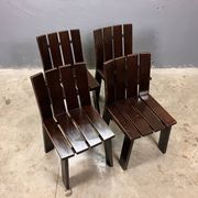Brutalist and modernist dining chairs from the 1970s in architectural brown wood.