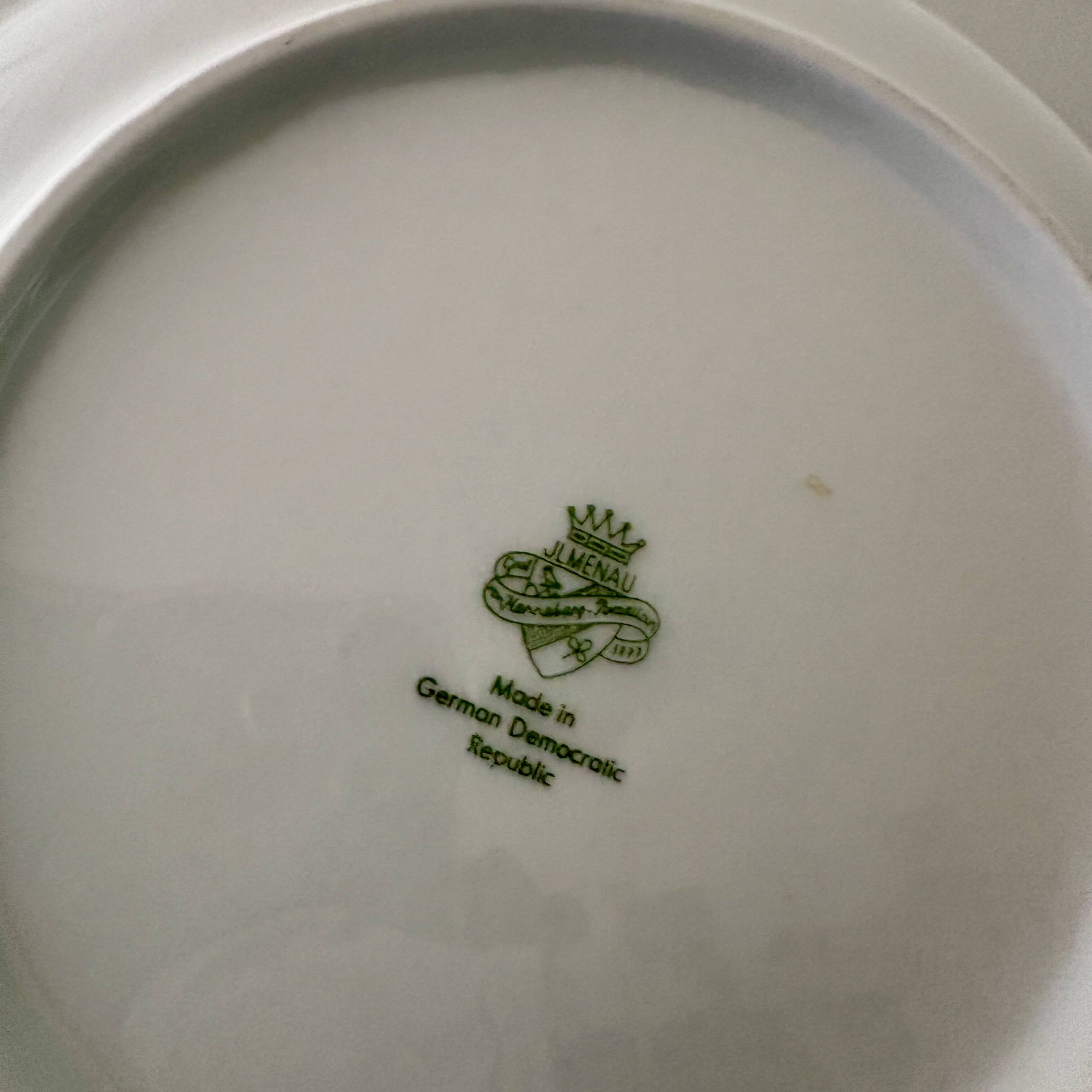 Set of 8 vintage deep plates in German porcelain.