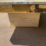 Vintage coffee table in travertine and brass.