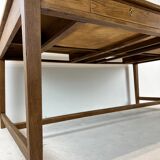 Two-sided oak work table, with 4 drawers