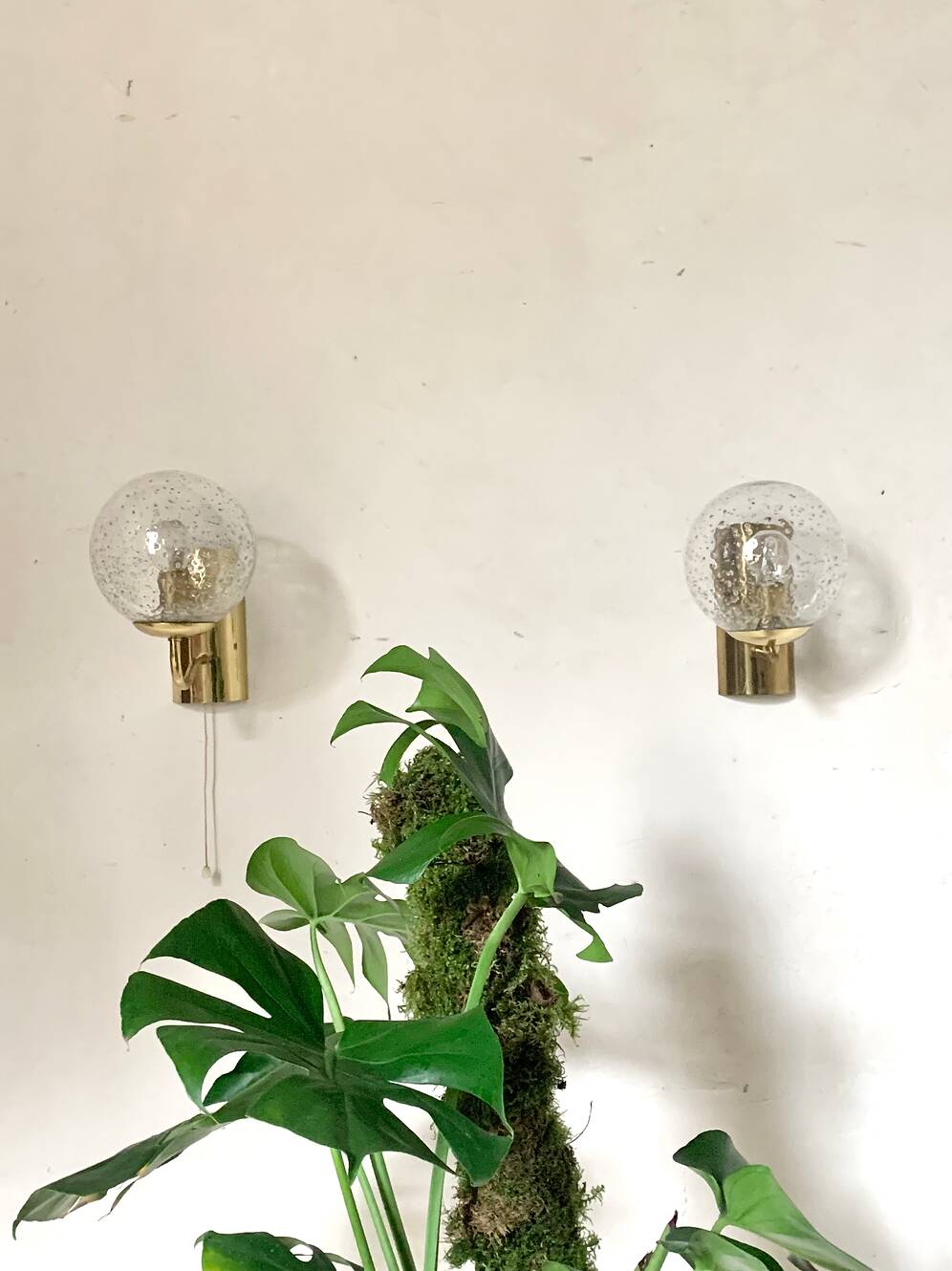 Pair of brass and glass wall sconces