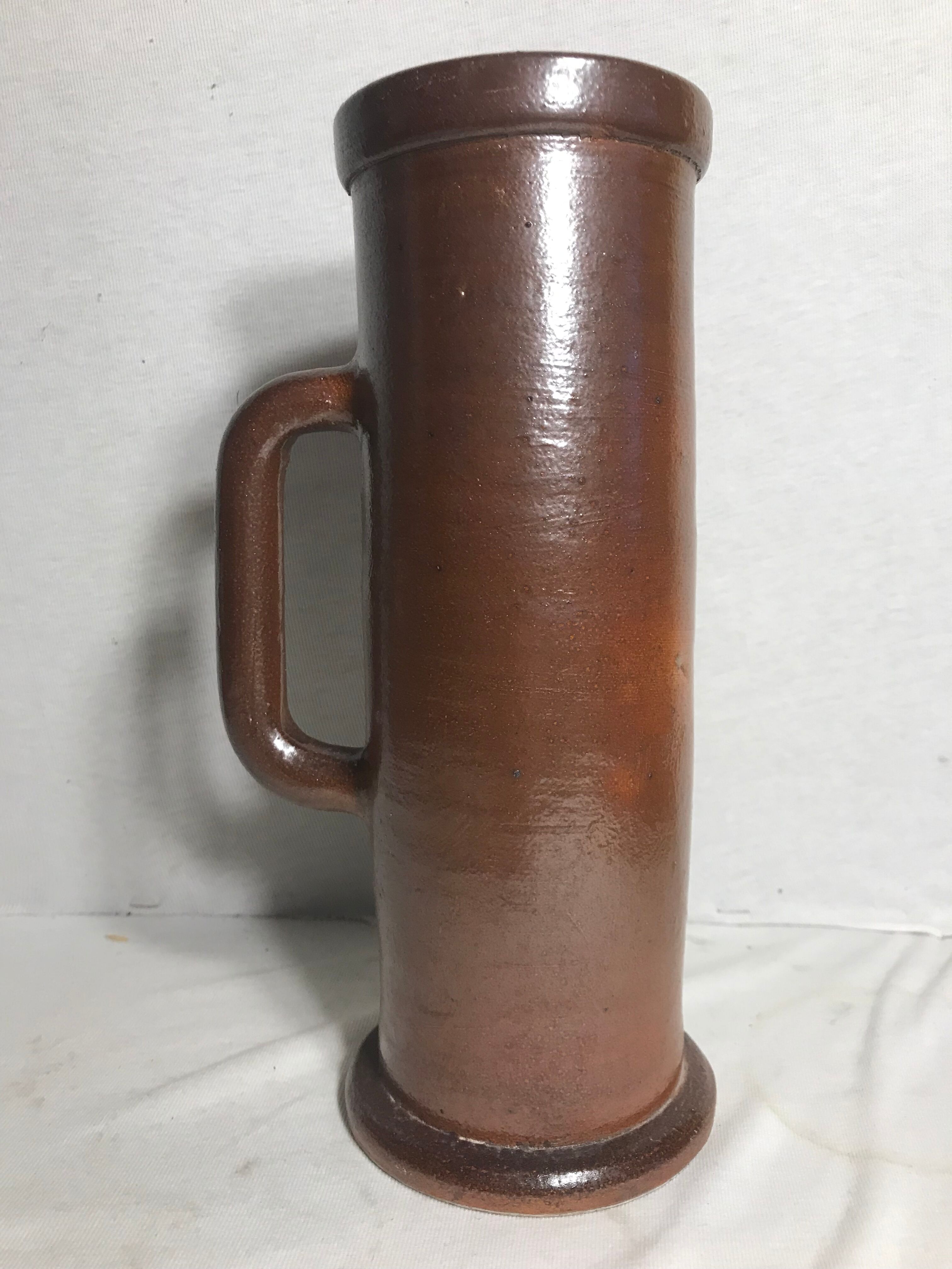 Old pitcher top in brown sandstone 70s