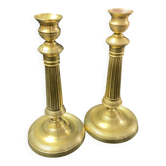 Paire de flambeaux bougeoirs XIXe bronze doré à fût cannelé Restauration