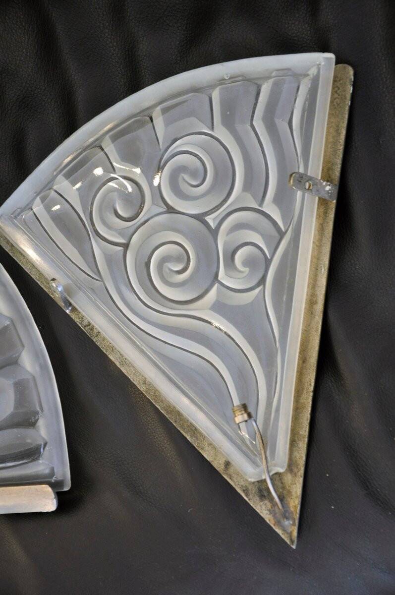 Pair of angular art deco wall sconces with silver metal frames