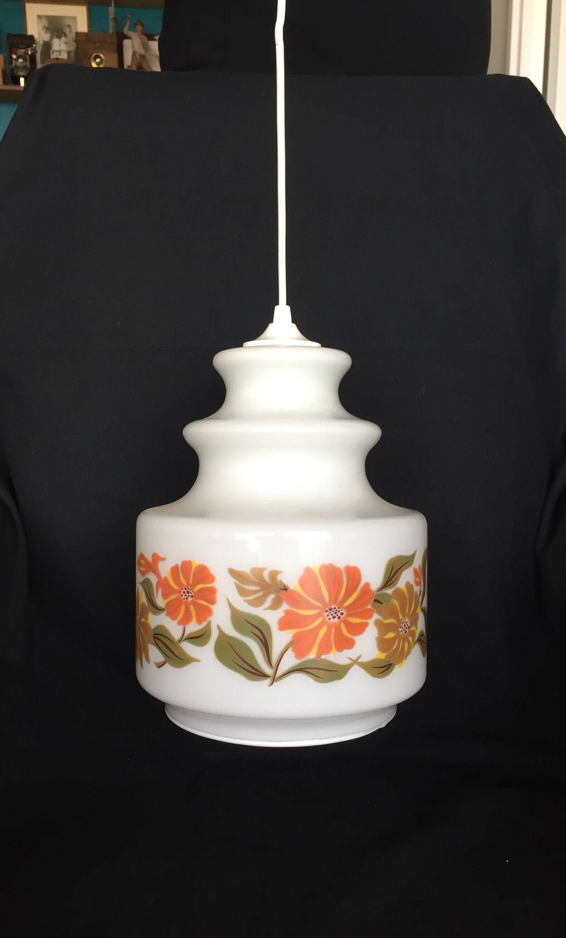 White globe and orange saucers stacked seventies pop