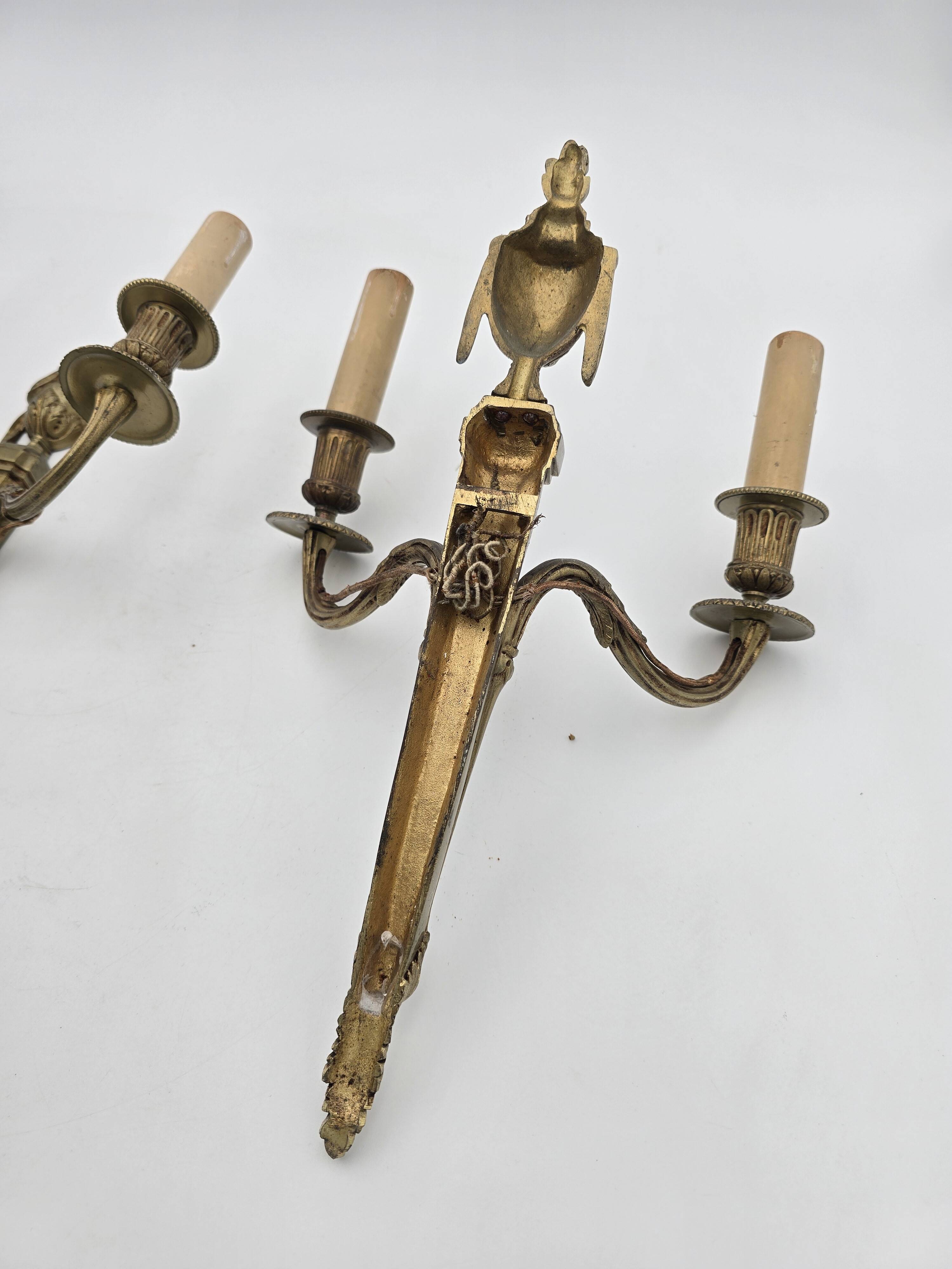 Pair of antique Louis XVI style bronze wall lights