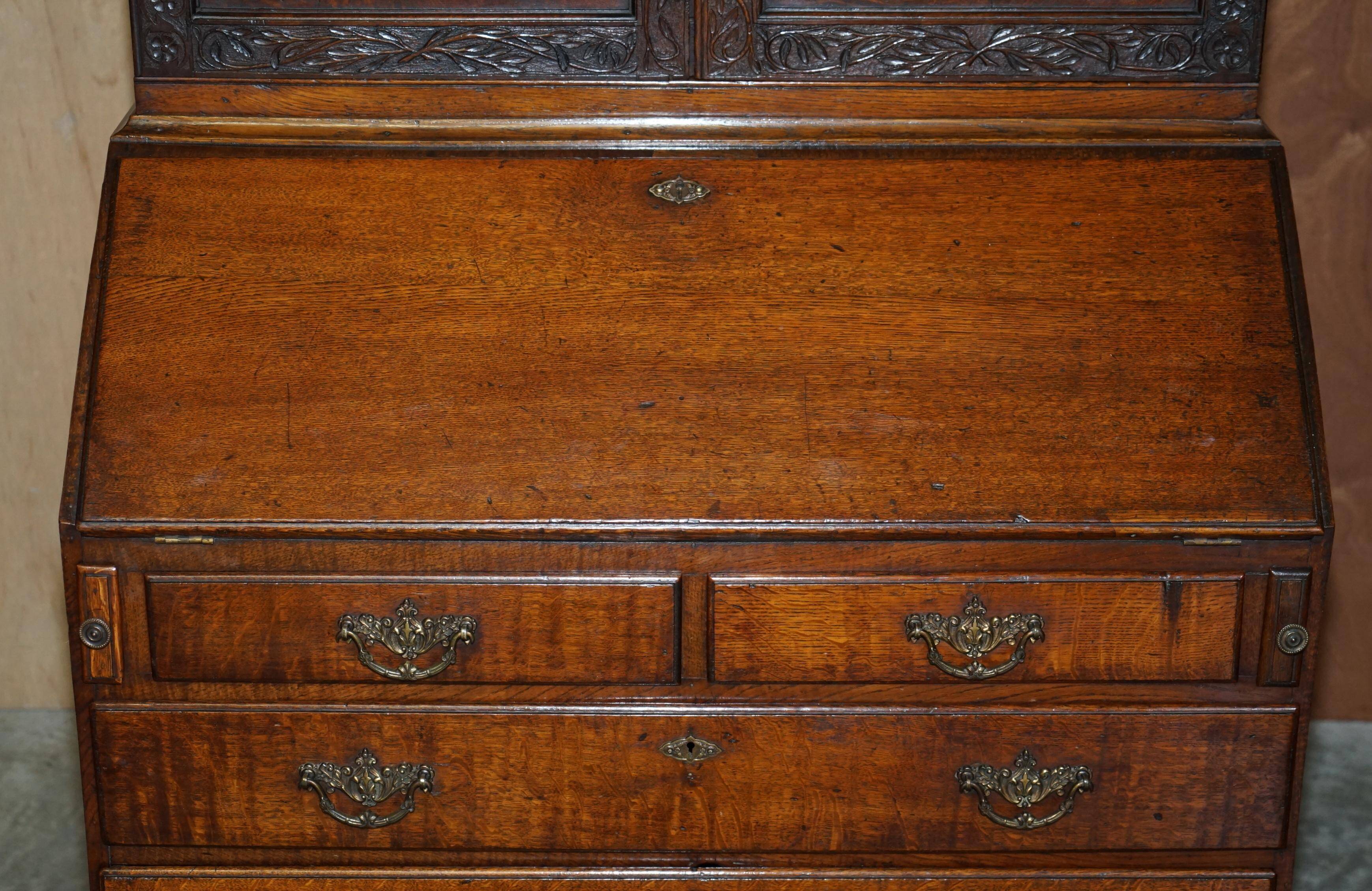 George III oak secretary bookcase circa 1760, Thomas Chippendale style.