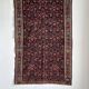 Iranian rug with stylised floral patterns in pink and blue, 155x105.
