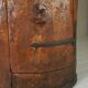 Primitive folk art cabinet made of an old tree trunk.