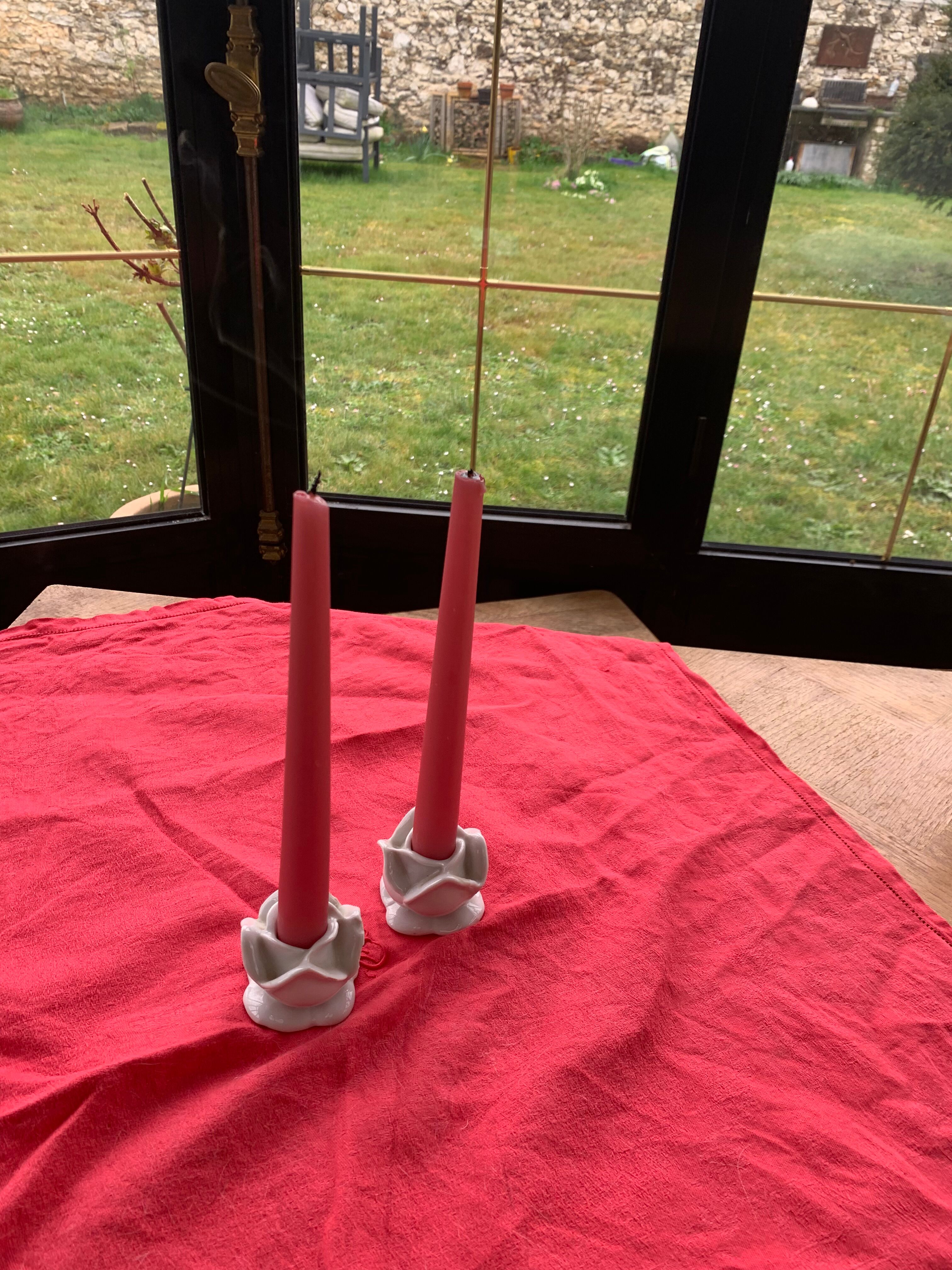 Two vintage white porcelain flower candle holders