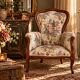 Louis XV style armchair with floral jacquard upholstery.