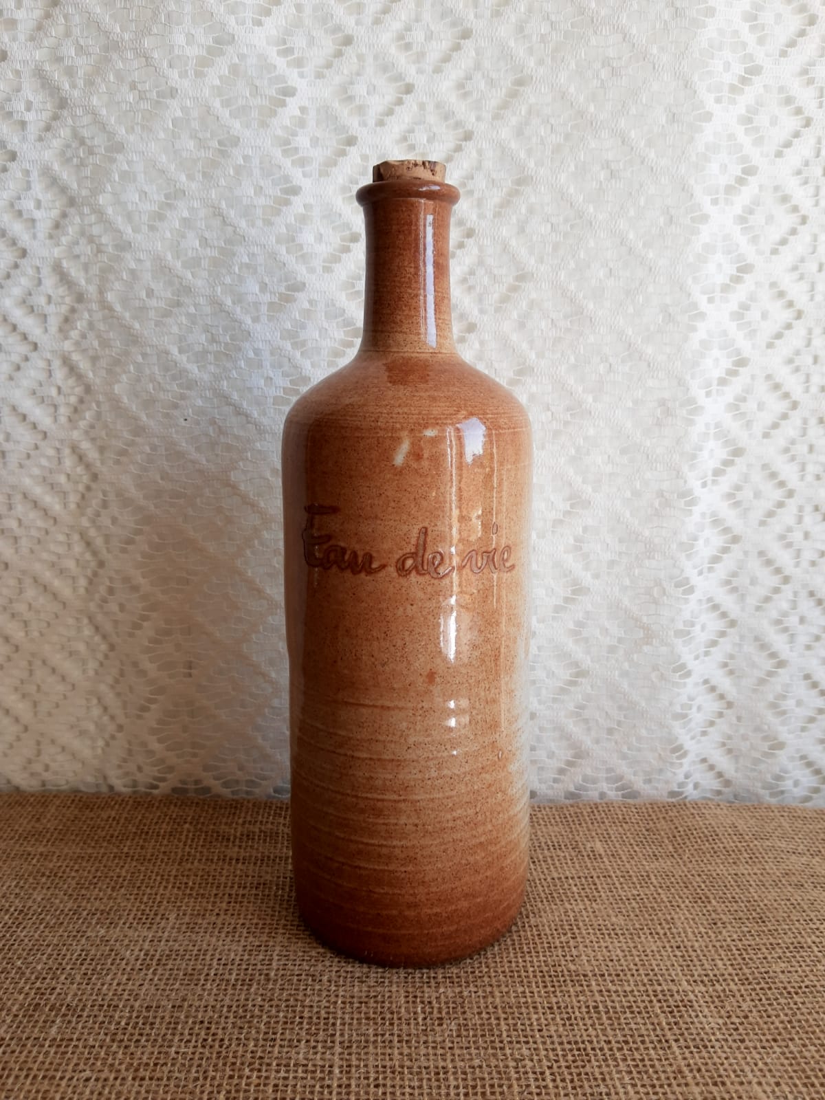 Vintage Mongolfier stoneware brandy bottle