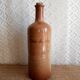 Vintage Mongolfier stoneware brandy bottle