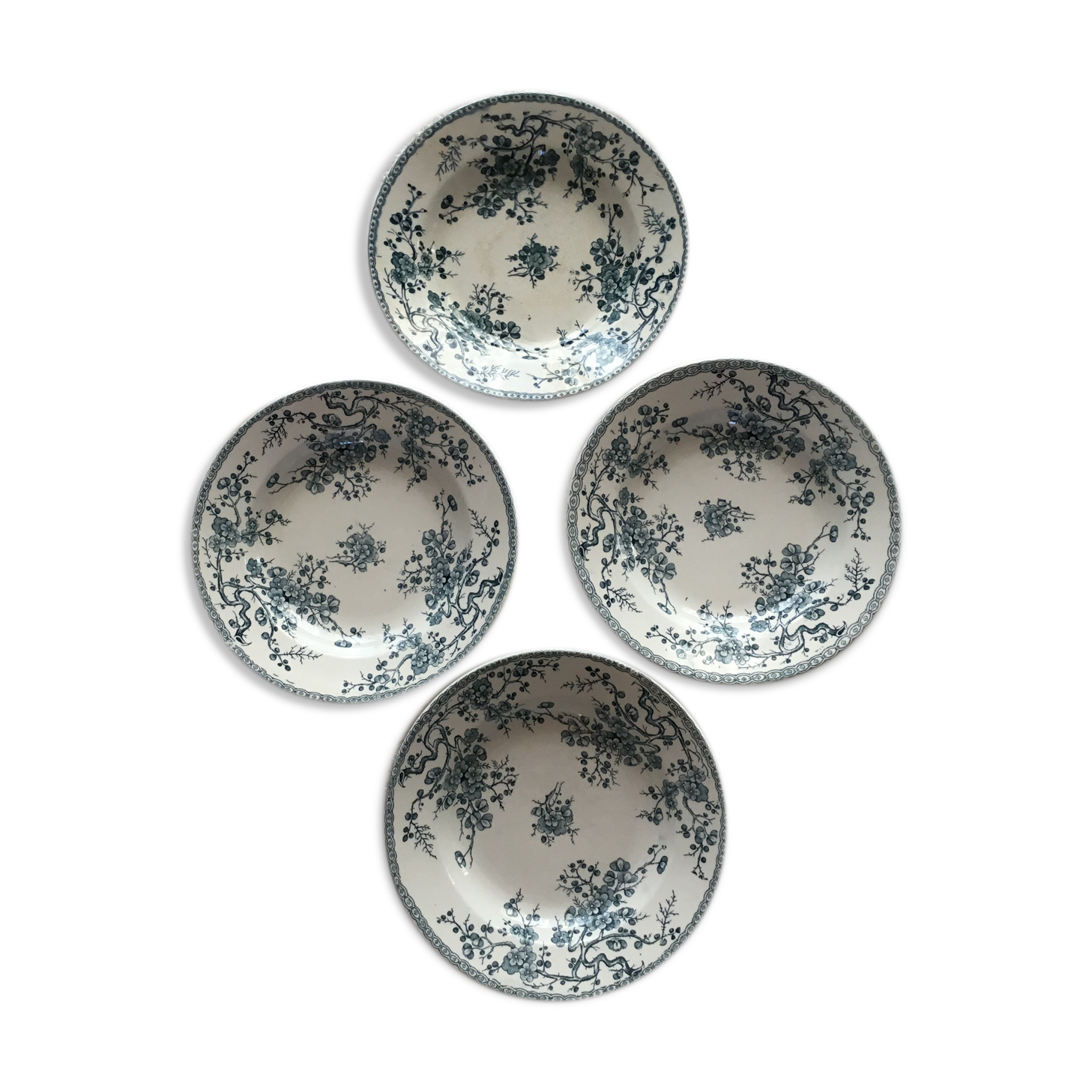 Set of 4 plates of the faience factory of gien