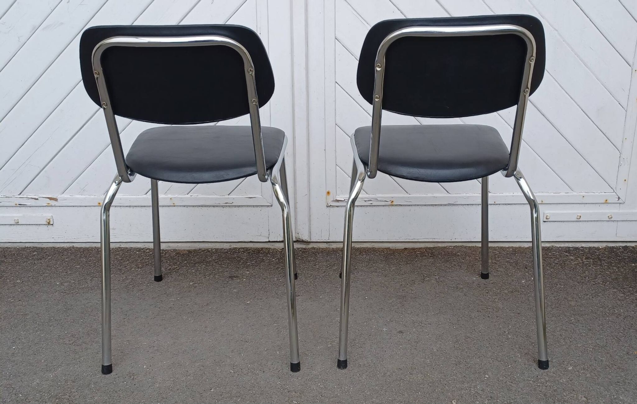 Pair of vintage faux leather and chrome chairs