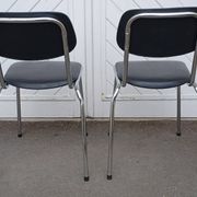 Pair of vintage faux leather and chrome chairs