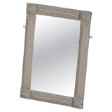 Wall mirror in tramp art style, hand-carved with a painted white frame, early 1900s.