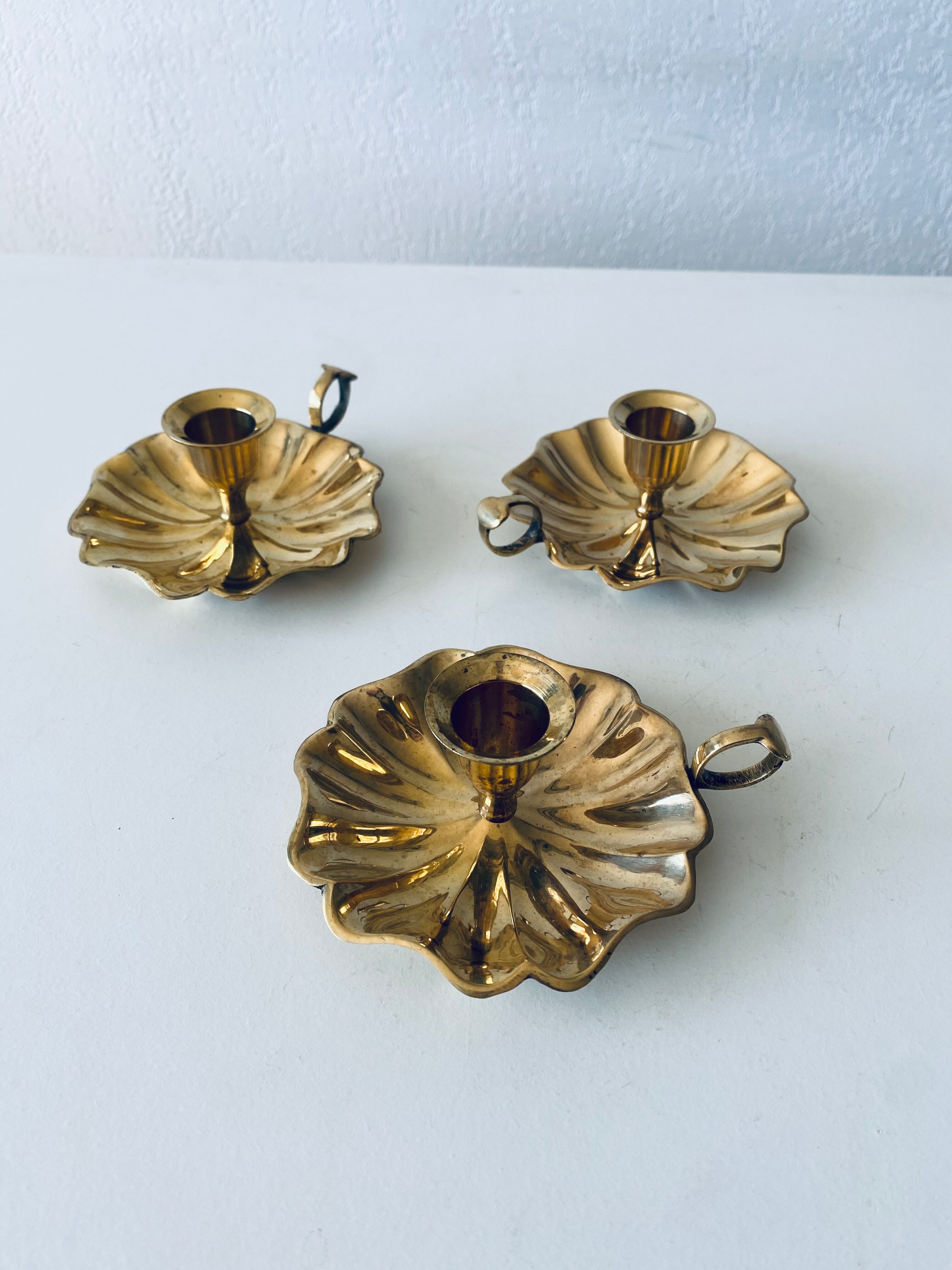 Indian candle holder in golden brass