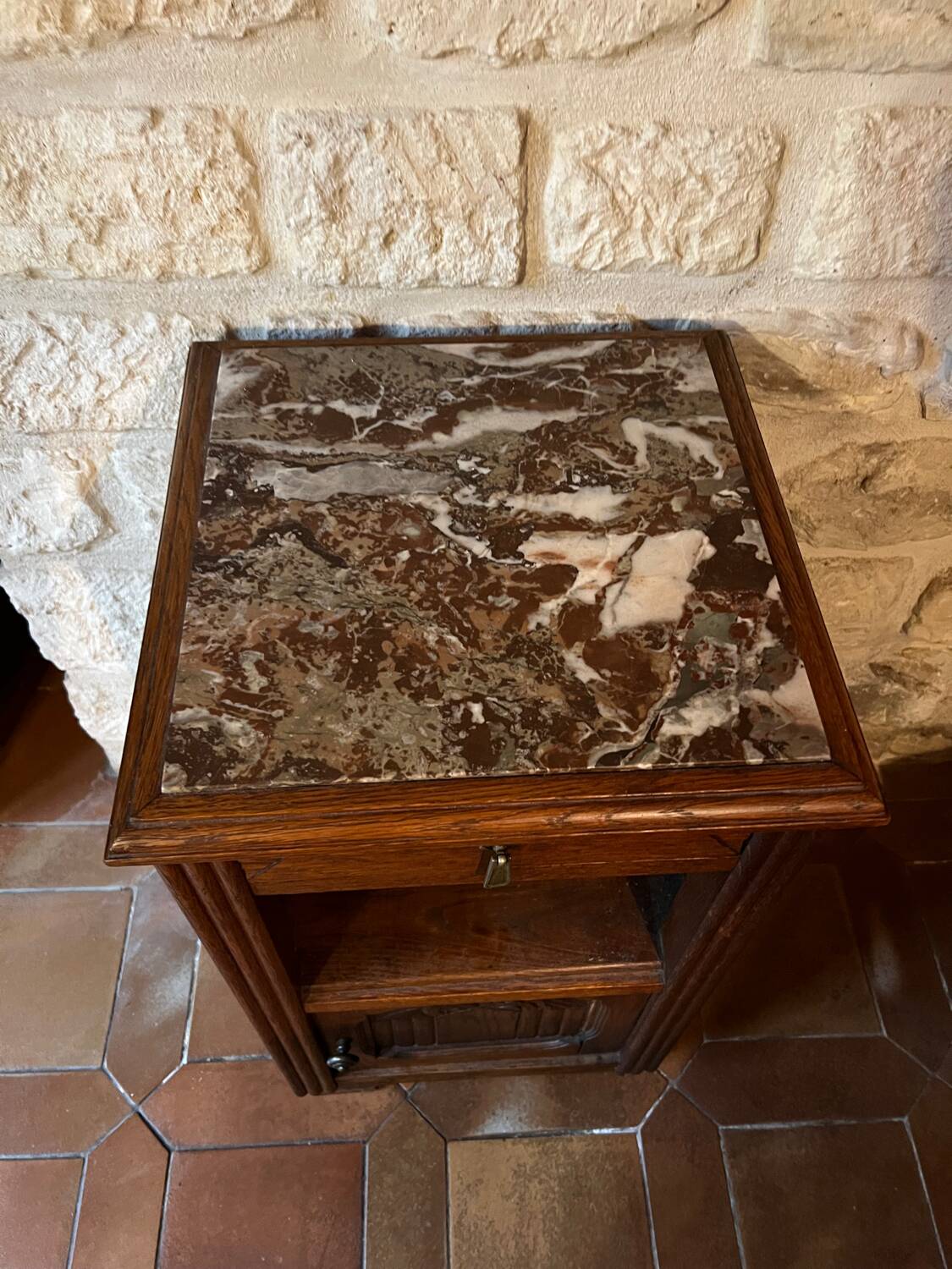 Antique bedside table with marble top