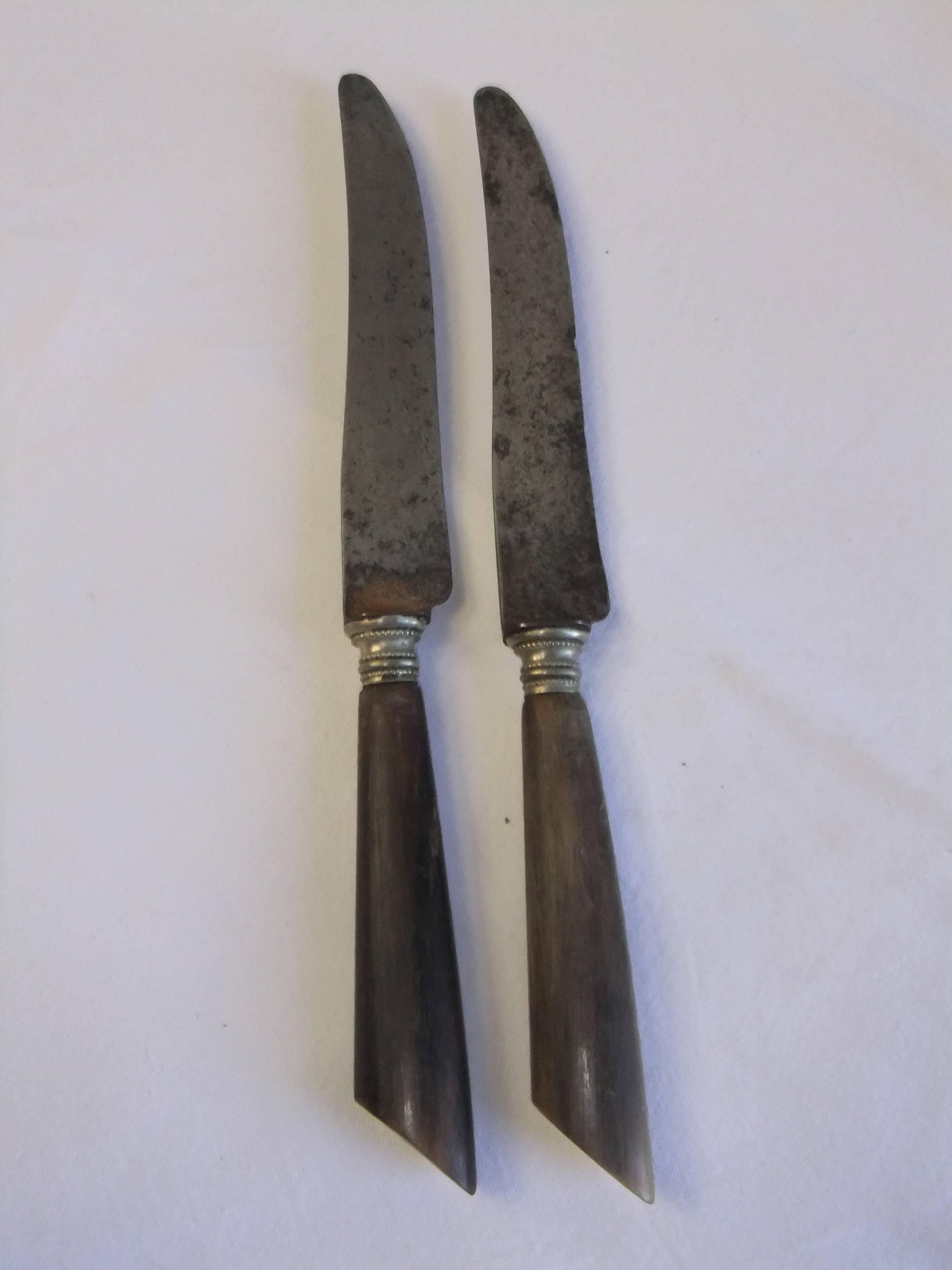 Table service knives old steel blade horn ferrule