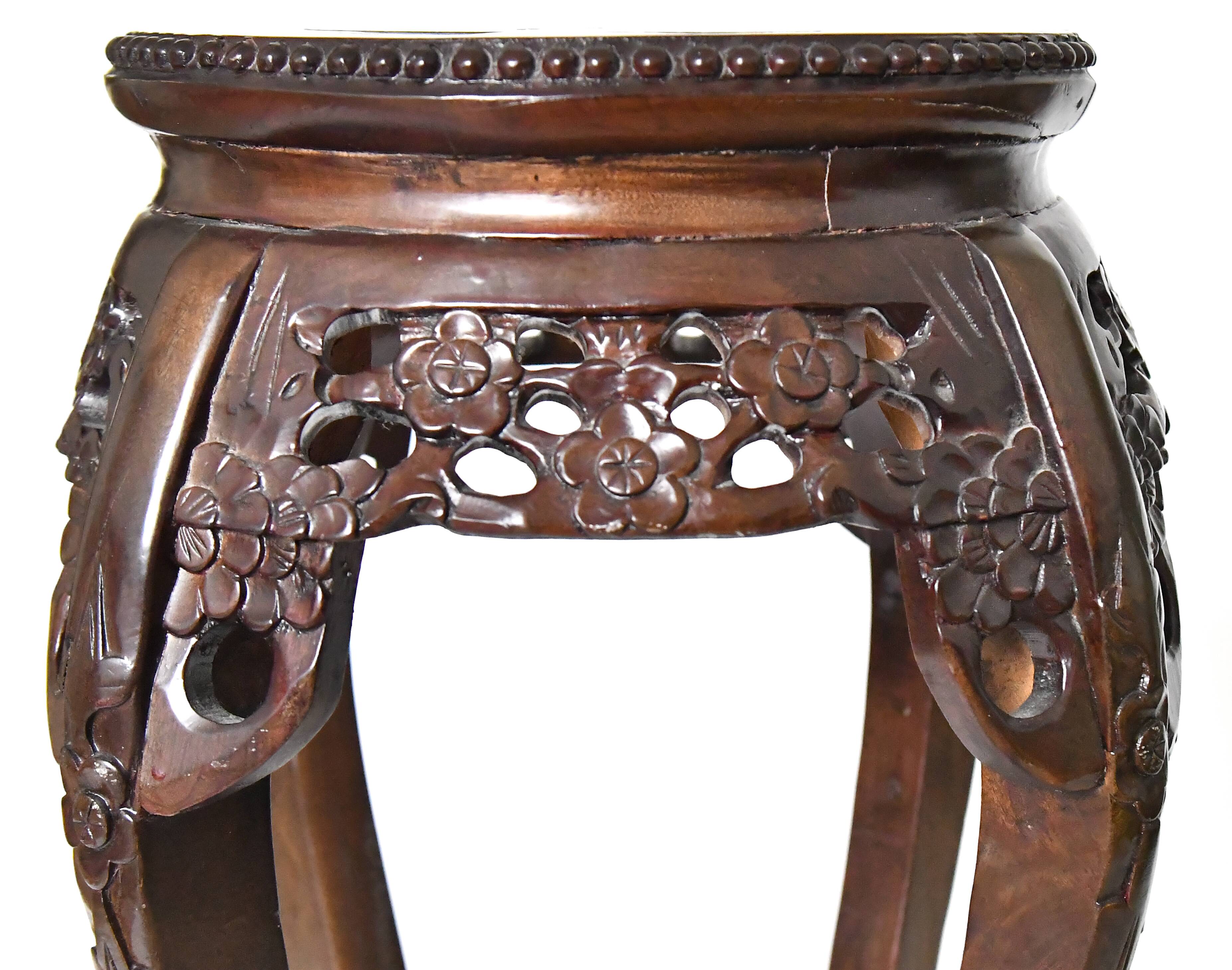 Chinese harness in richly carved wood and marble top