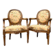 Paire de fauteuils médaillon en bois naturel de style Louis XVI