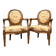 Paire de fauteuils médaillon en bois naturel de style Louis XVI
