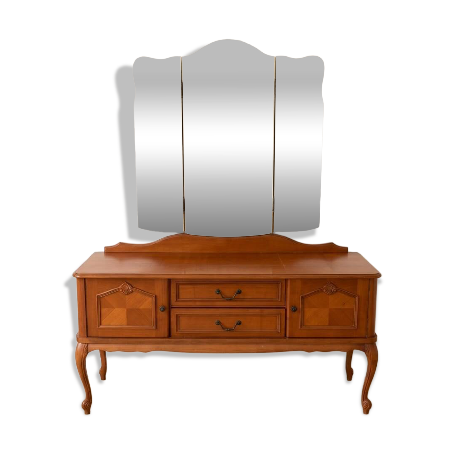 Antique wooden dressing table with a triptych mirror.