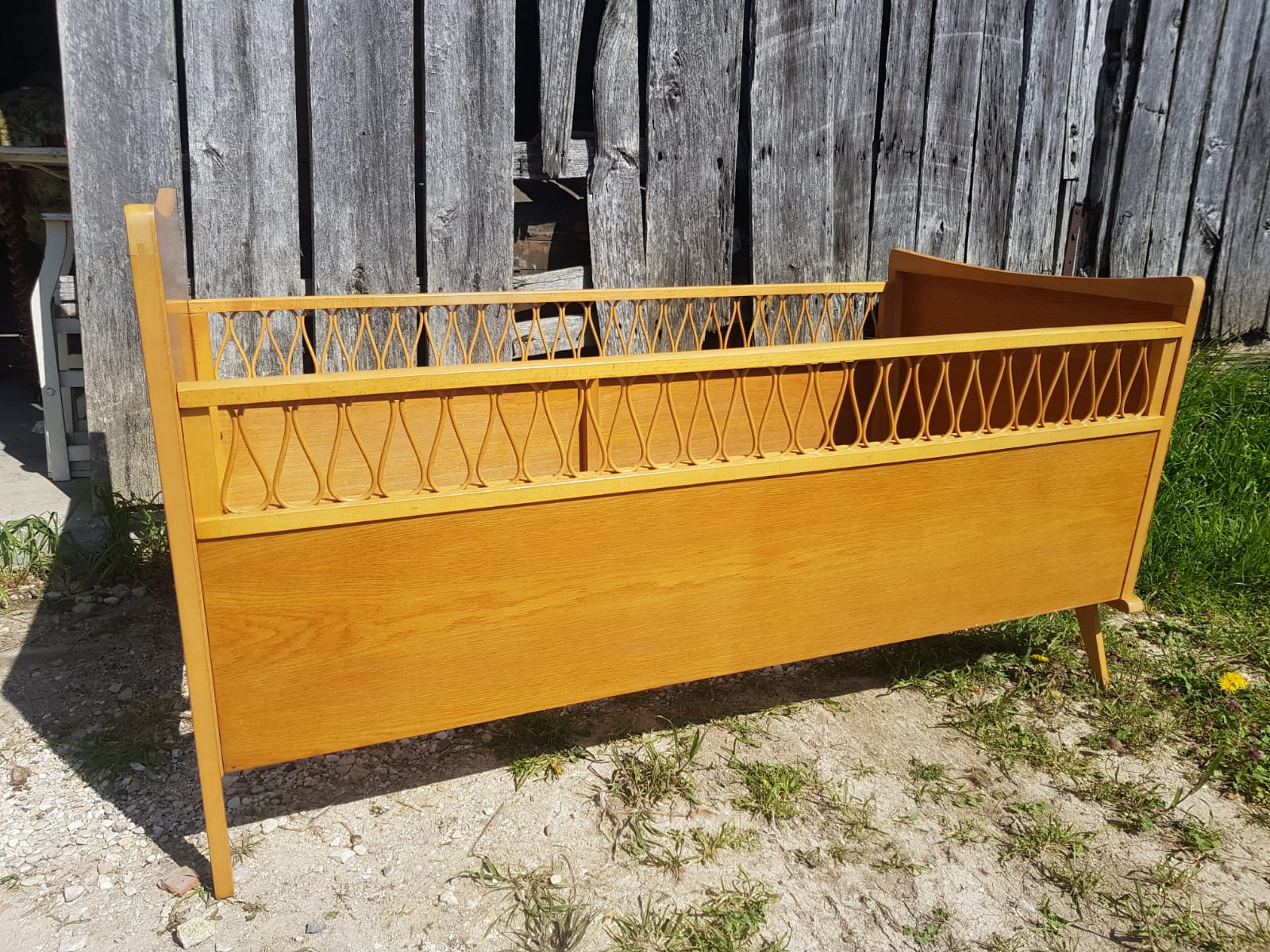 Scandinavian children's bed, wooden compass feet with vintage curved rattan