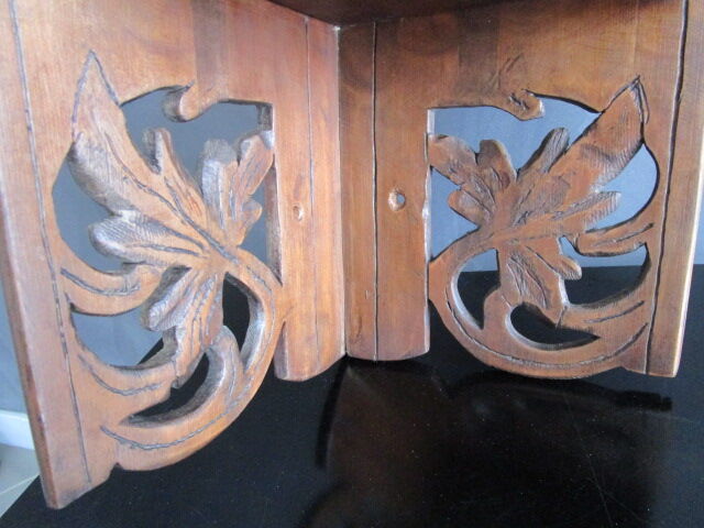 Old corner shelf in worked wood