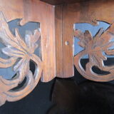 Old corner shelf in worked wood