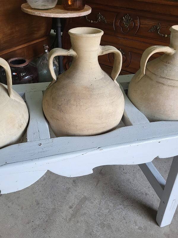Antique painted wooden jar holder with 4 earthenware jars