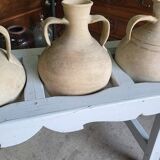 Antique painted wooden jar holder with 4 earthenware jars