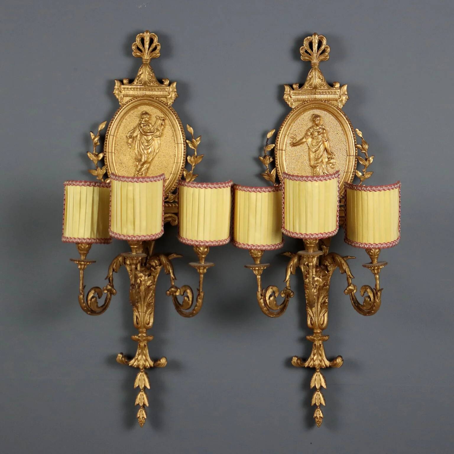 Antique neoclassical wall sconces in iron and wood, 19th century.
