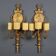 Antique neoclassical wall sconces in iron and wood, 19th century.