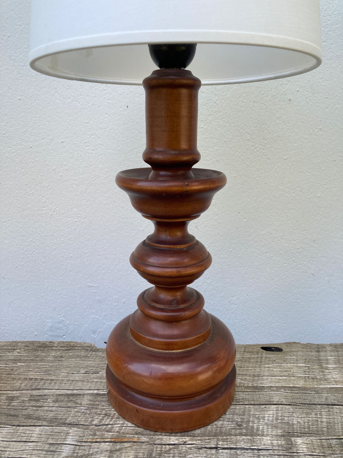 Vintage turned wooden lamp and white lampshade