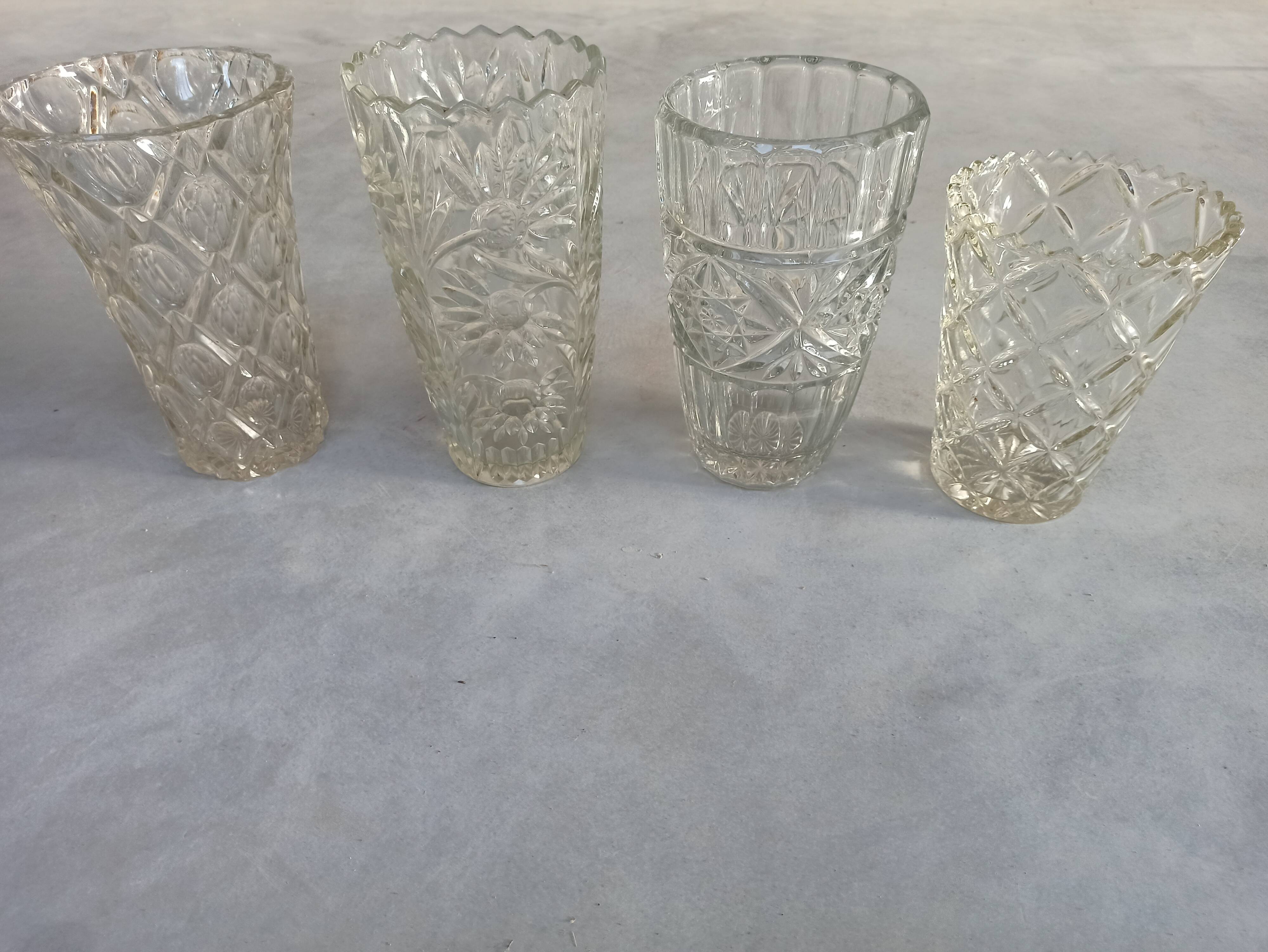 Four bohemian crystal vases