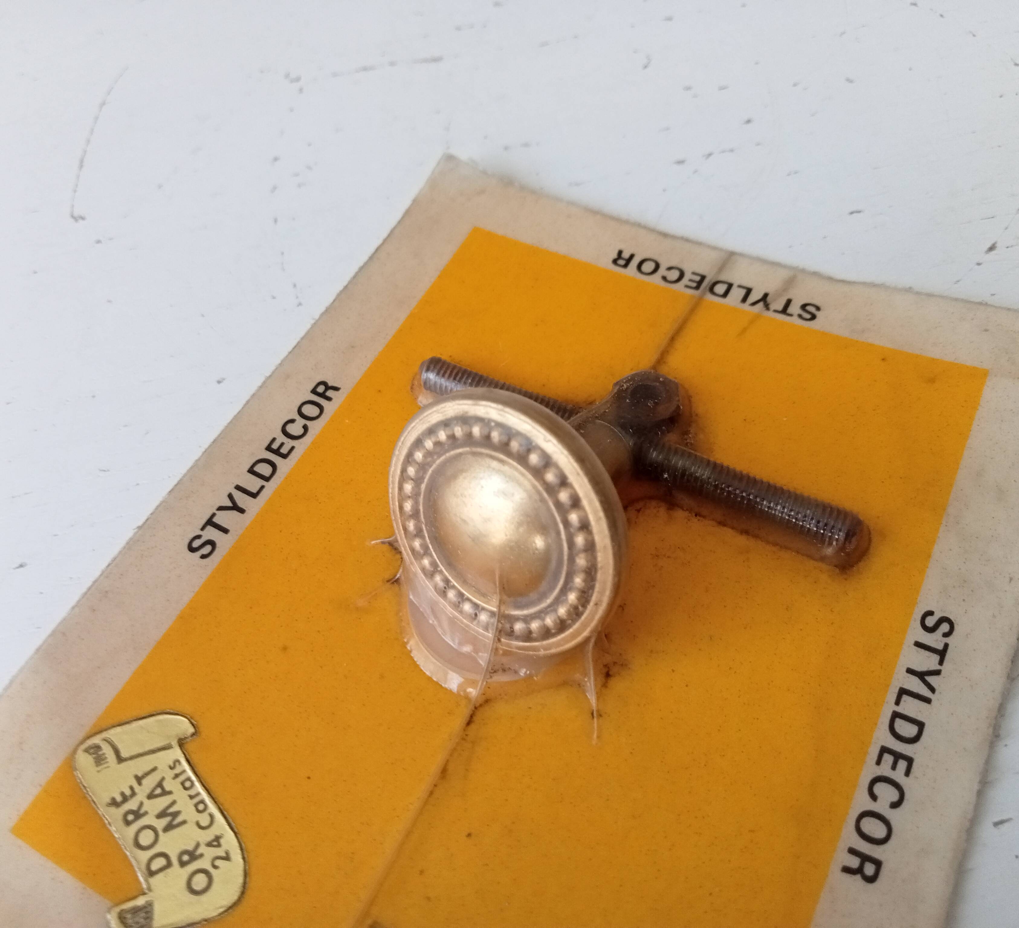 Vintage furniture knob in Louis XVI style, gilded with fine gold.