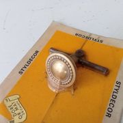 Vintage furniture knob in Louis XVI style, gilded with fine gold.