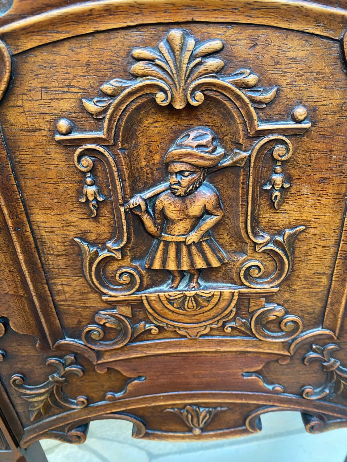 Carved walnut lounge chair