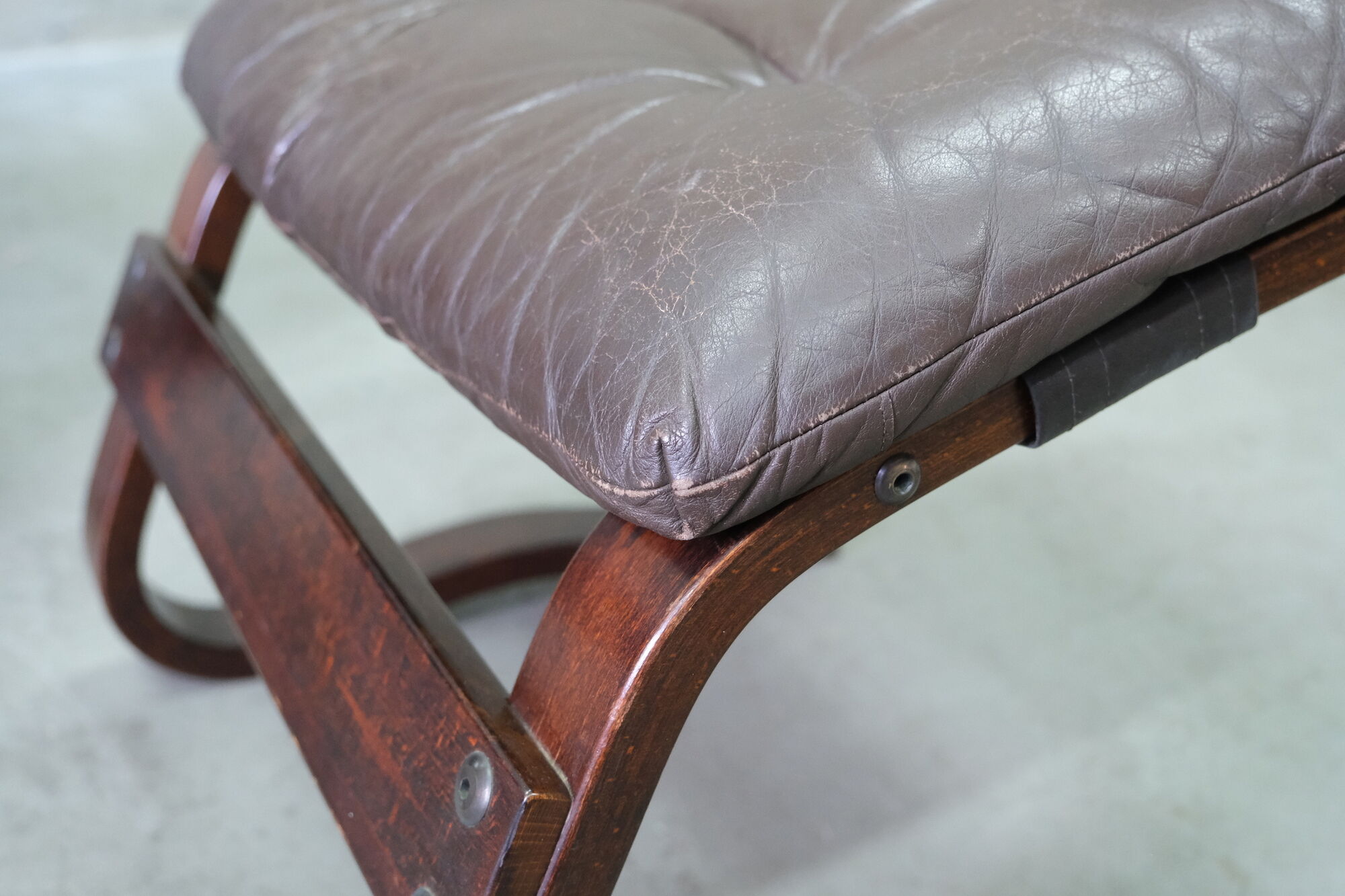 Mid century leather armchair and foot stool by Erda & Nordahl Solheim, Norway 1970's