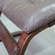 Mid century leather armchair and foot stool by Erda & Nordahl Solheim, Norway 1970's