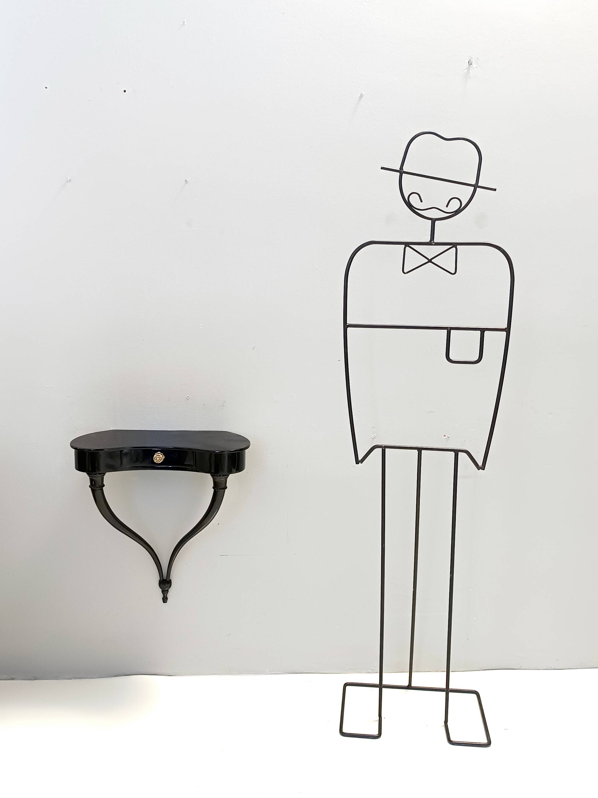 Pair of Black Wall-Mounted Console Tables / Nightstands attr. to Ulrich