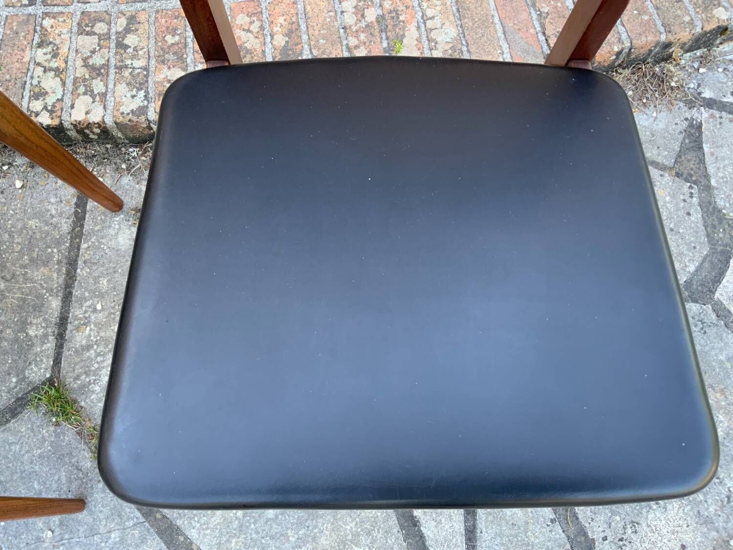 4 Scandinavian black leatherette chairs
