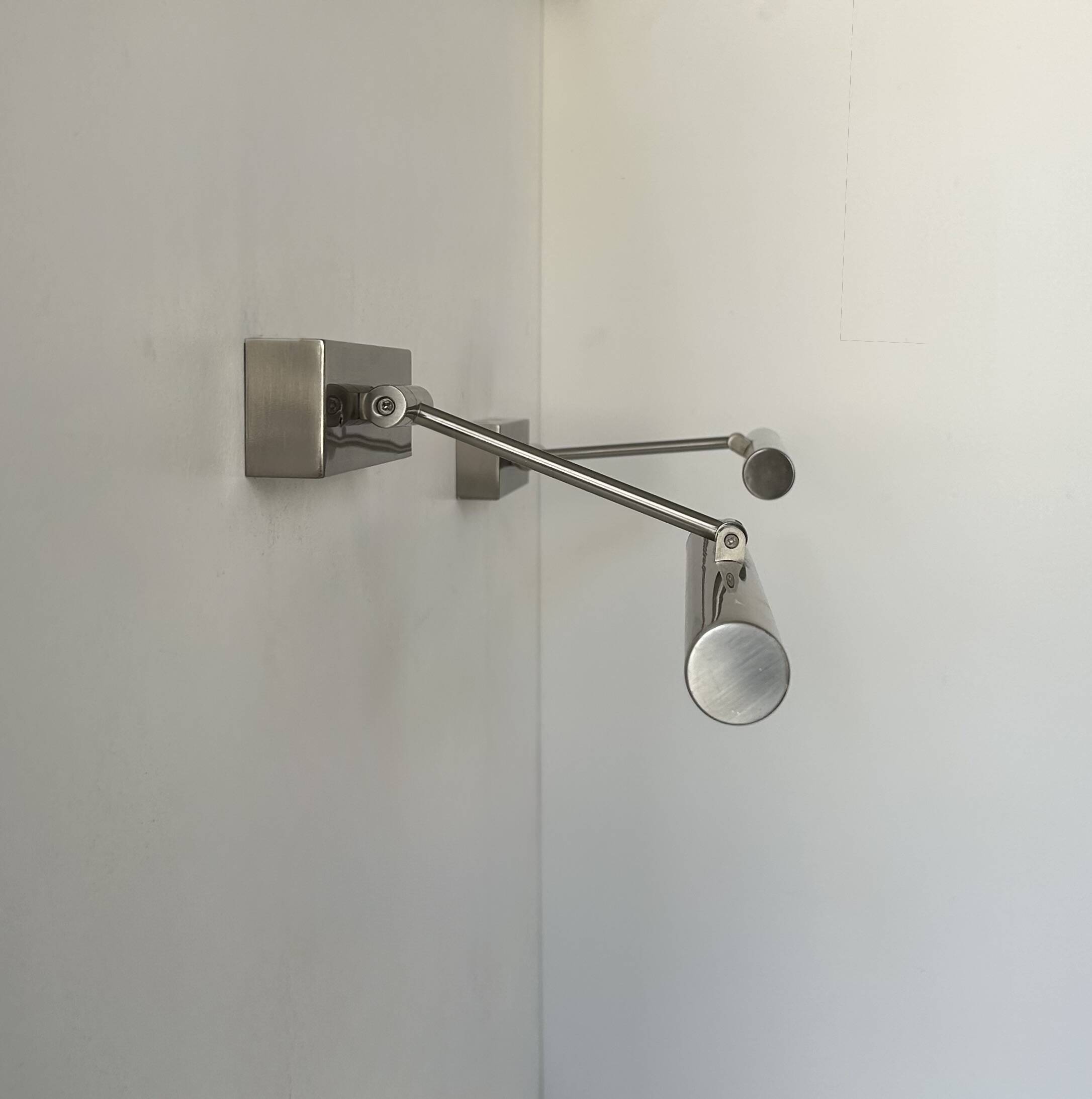 Pair of vintage chrome adjustable wall lights, France, 1980