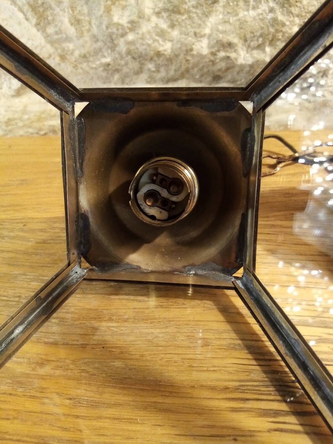 Glass and brass suspension